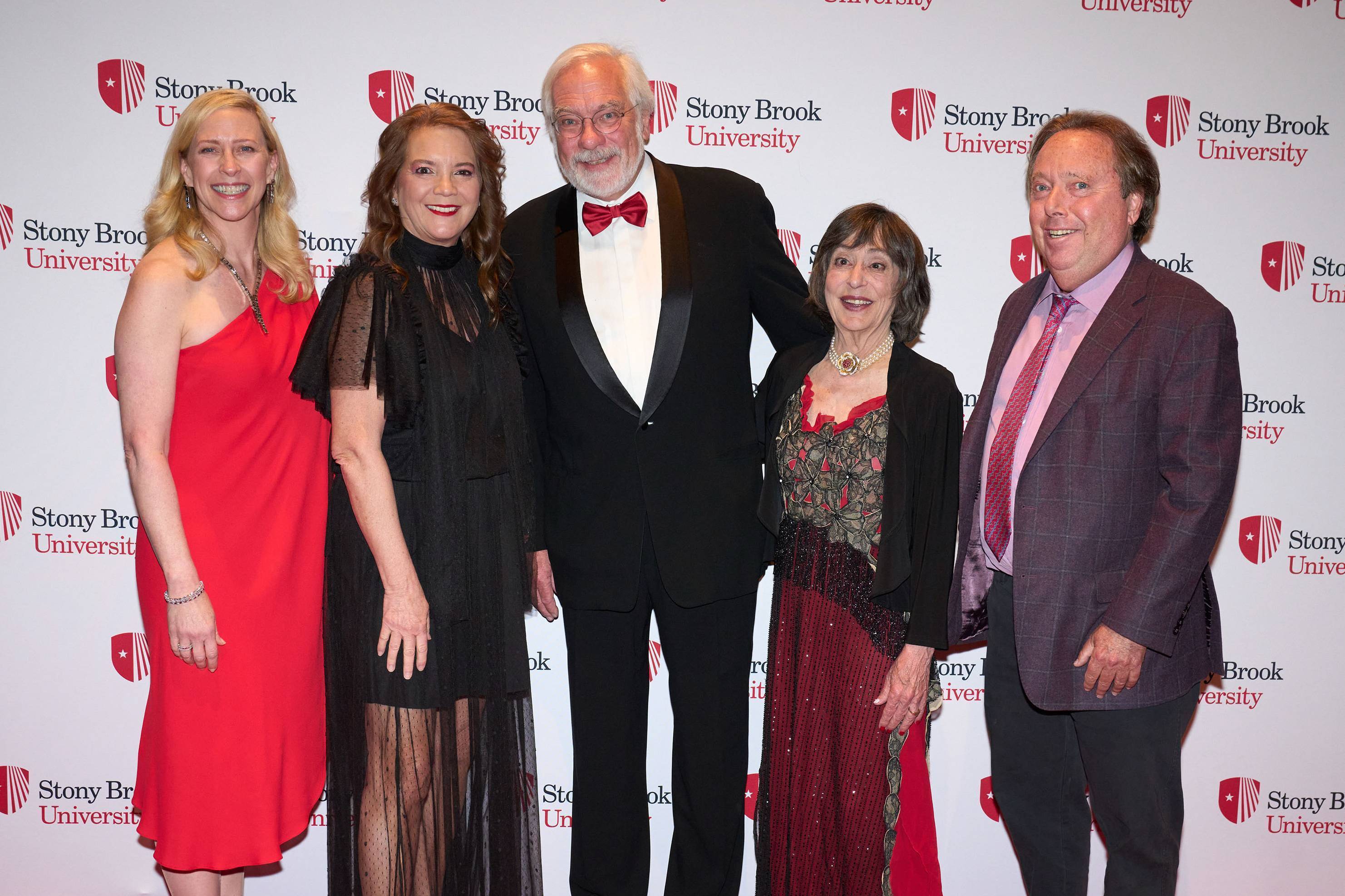 From left to right: Stony Brook University President Maurie McInnis, Peggy Gelfond, honorees Robert J. Maze and Laurie Landeau, and Rich Gelfond, Stony Brook Foundation chair and CEO of Imax Corporation.