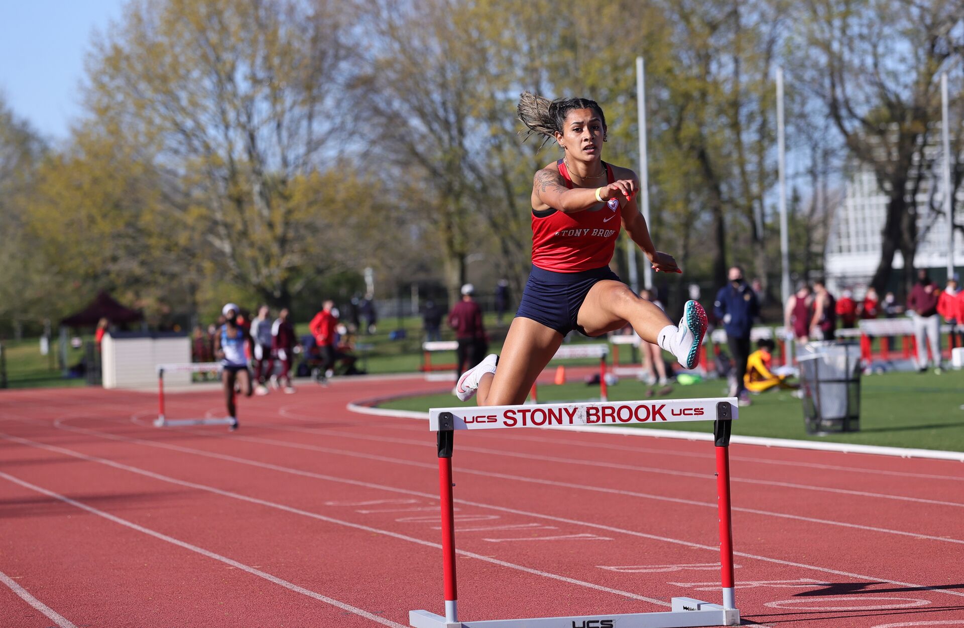 Track Runner Jumping Hurdle